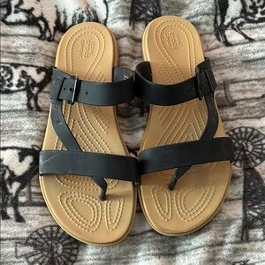 CROCS Black and Tan Sandals with Textured Footbed